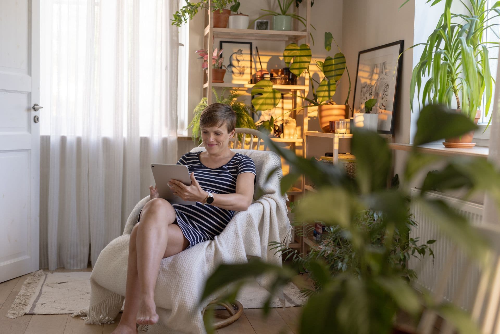 658823 Woman Tracking Health on Tablet Web Version 1920px