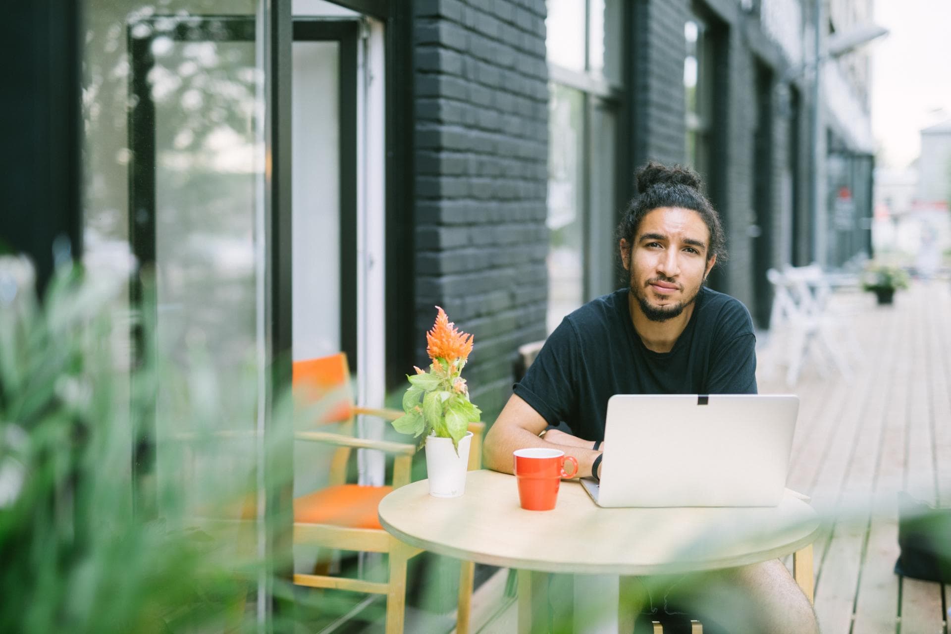 Man Working in Cafe